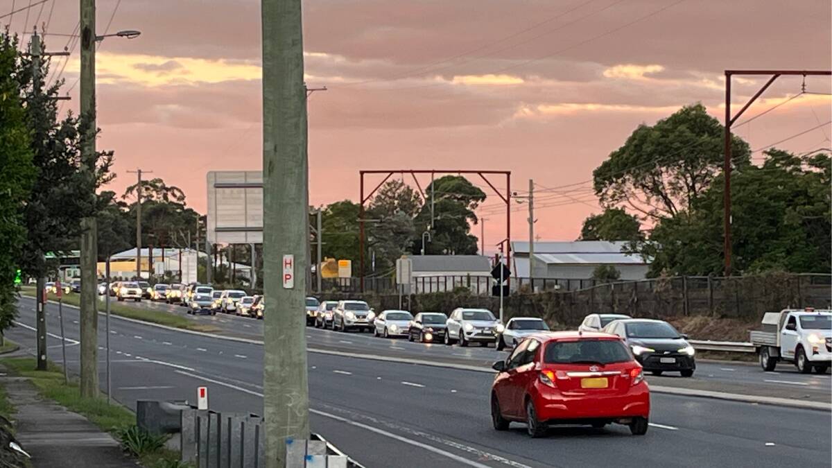 Traffic spilling onto the highway from Macquarie Road during peak hour. Picture supplied