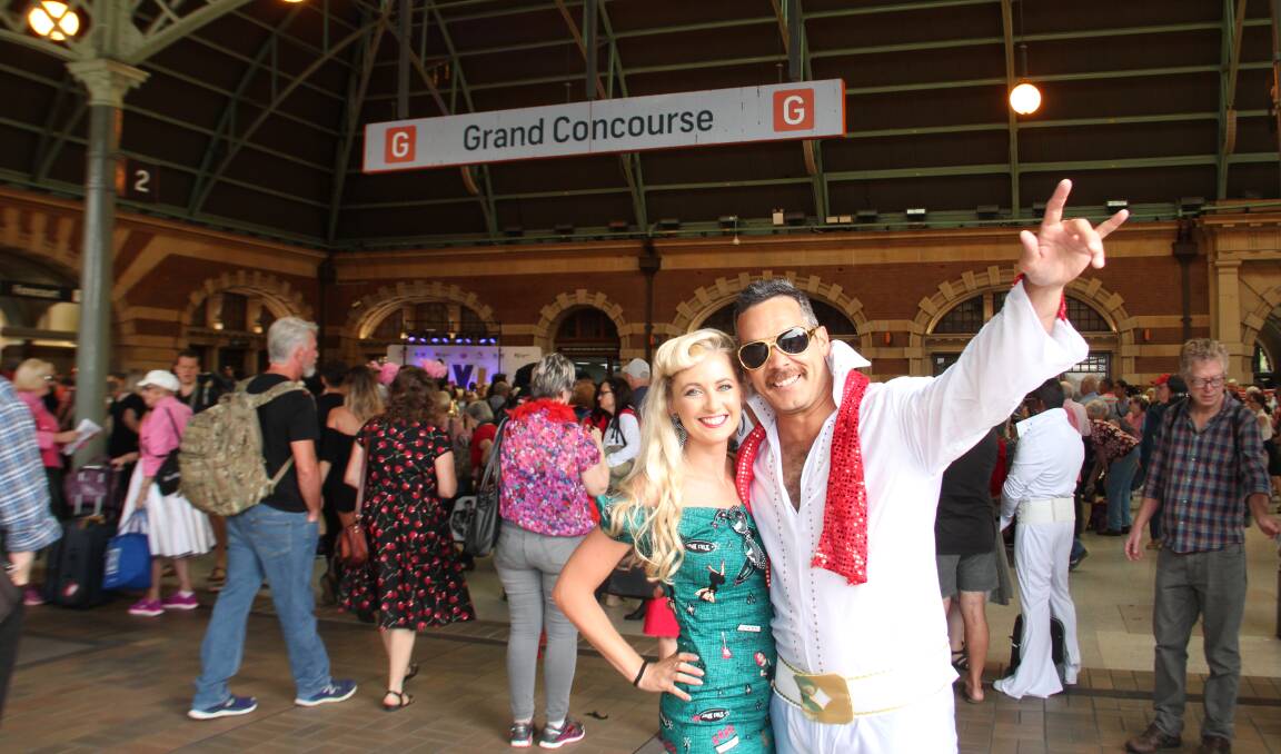 Parkes-bound Emily Dowswell and Dan Randall at Central Station in Sydney This morning. The Parkes Elvis Festival runs through to Sunday. Photo by Alex Druce.  