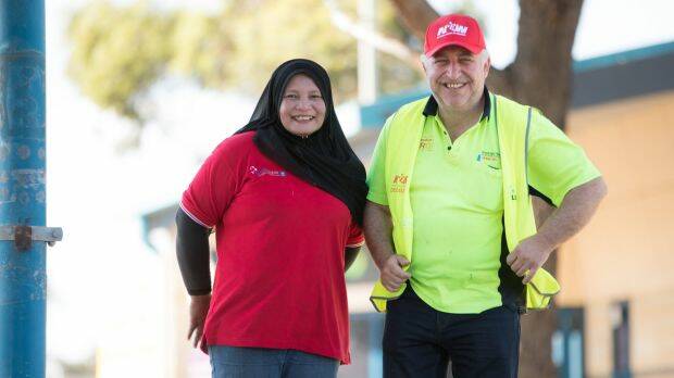 Workers Mahani Mohd Tif and Vince Tropea have won better pay and conditions. Photo: Simon Schluter