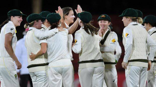 Breakthrough: Ellyse Perry celebrates the wicket of Georgia Elwiss, caught by Megan Schutt.  Photo: AAP