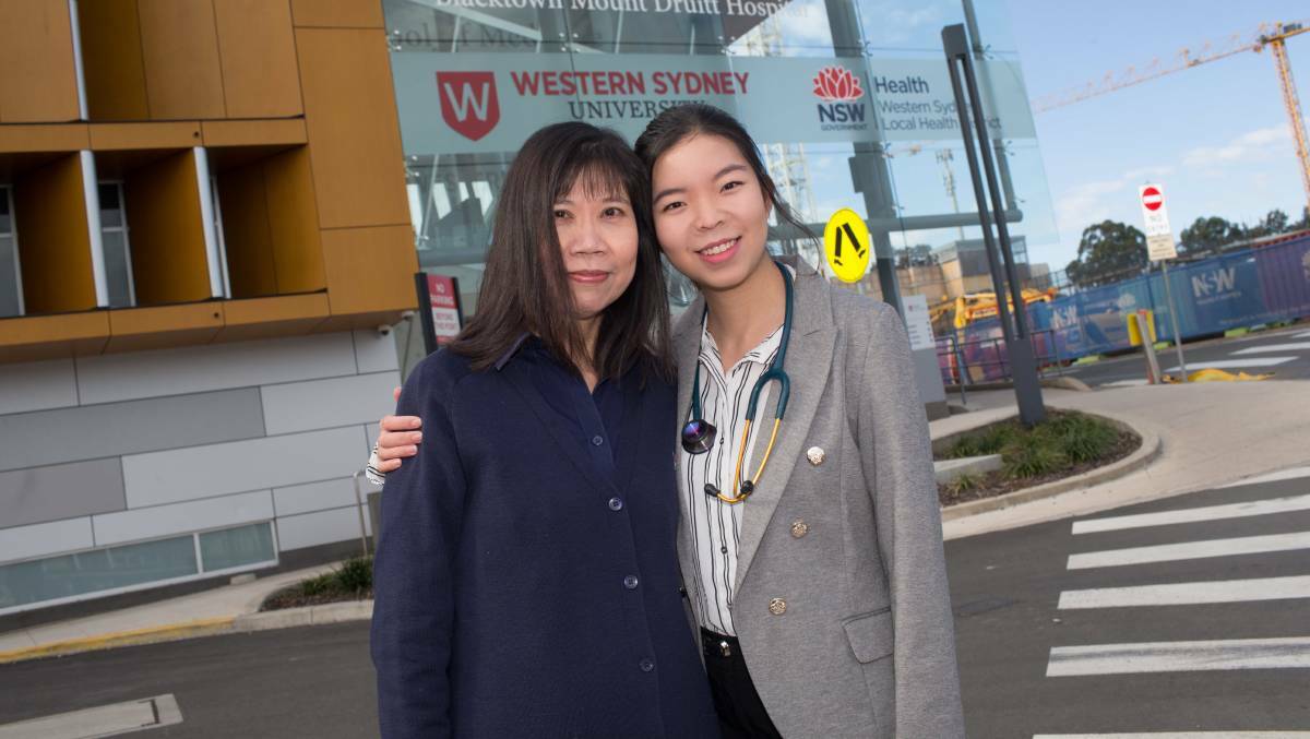 IN HER FOOTSTEPS: Western Sydney University medical student Alice Leung is based at Blacktown Hospital, where her mother Stella Lau is a nurse. Picture: Geoff Jones