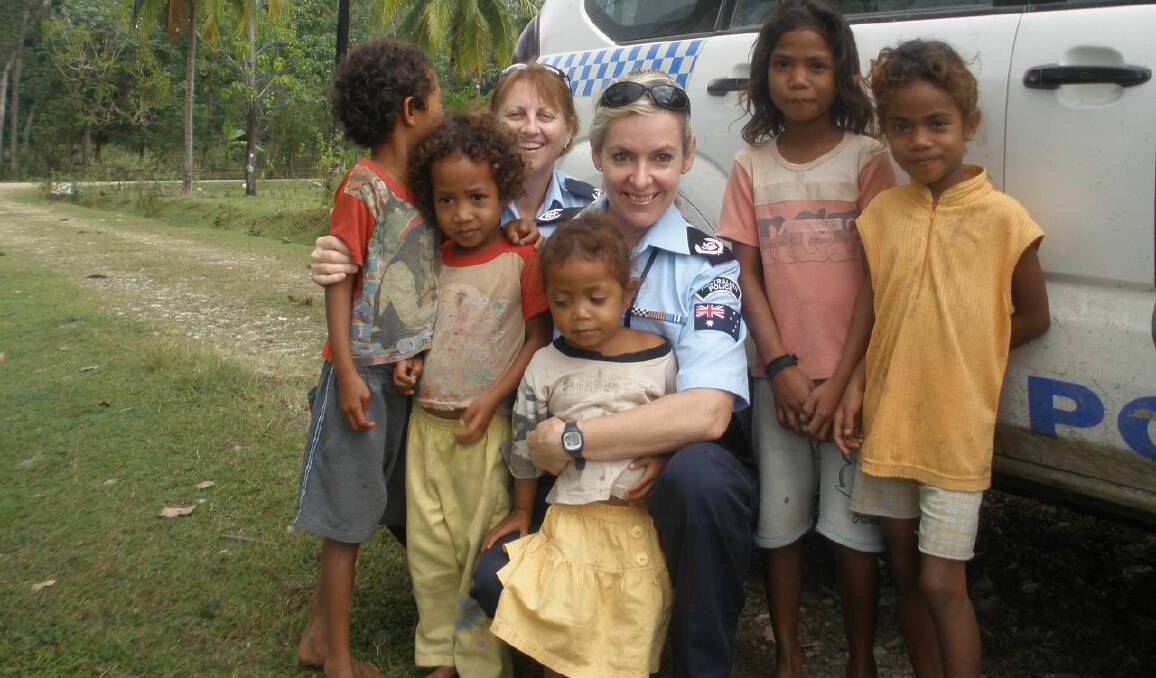 PCYC in East Timor: Libby Bleakley (right) and Teresa Beck with children in the District of Viqueque.