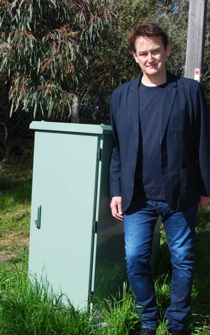 No signal: Jon Dee and the NBN box which won't be in action until next year.