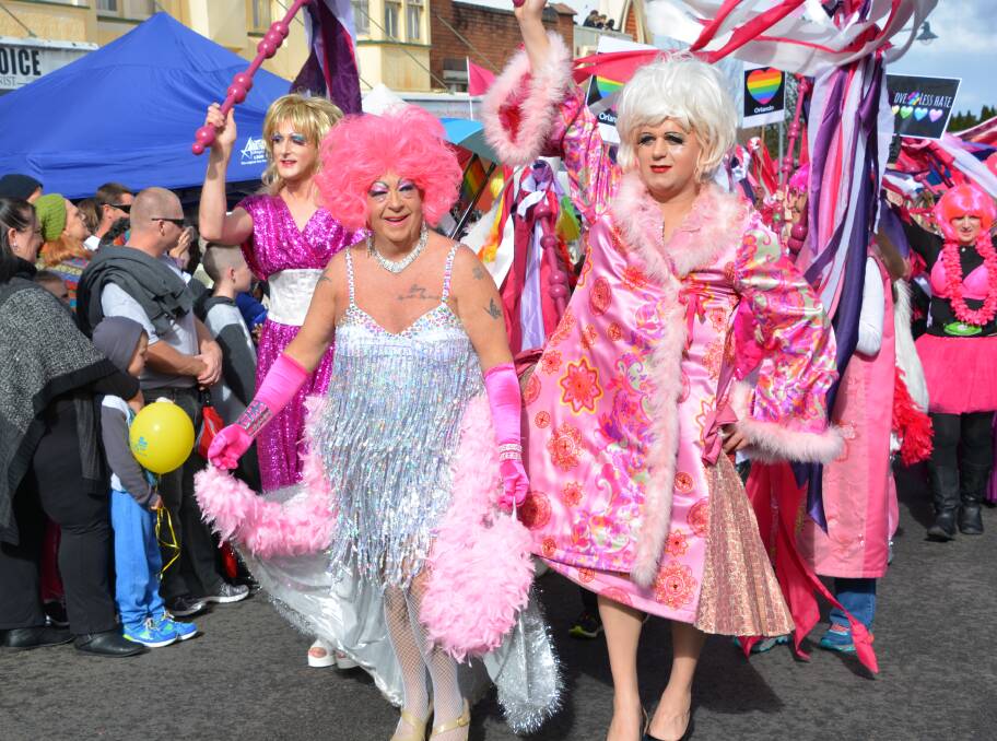 Fabulous in a frock: Some of the participants in last year's Winter Magic parade. Council has now backed all community festivals for 12 months. Organisers will have to find their own funds from that point on.