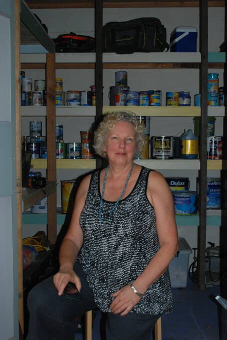 Just a few tins: Lindena Robb at the door of her paint shed.