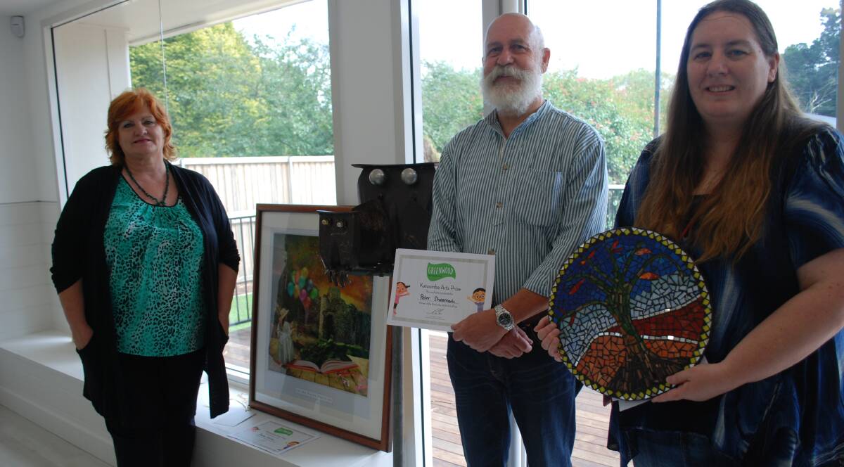 Winners: Yvonne Larkins with her painting, Peter Shoemark with his sculpture and Melanie Michael with her mosaic mandala. 
