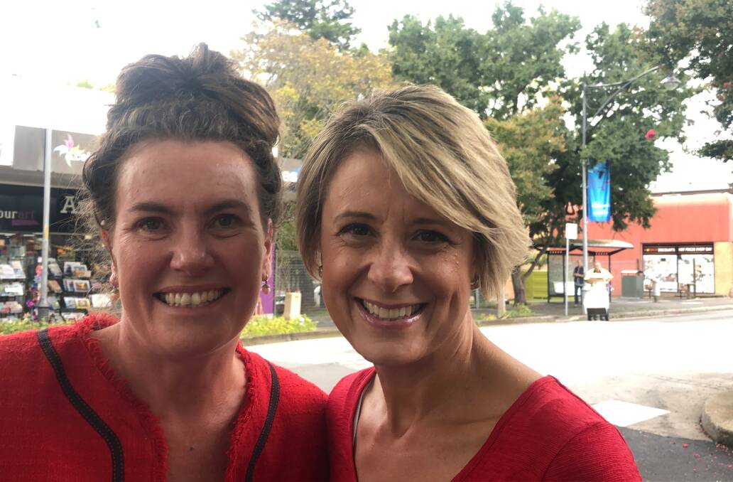 Red shirt brigade: Trish Doyle was joined by former NSW premier, Senator Kristina Keneally, at the Springwood pre-poll booth on Monday.
