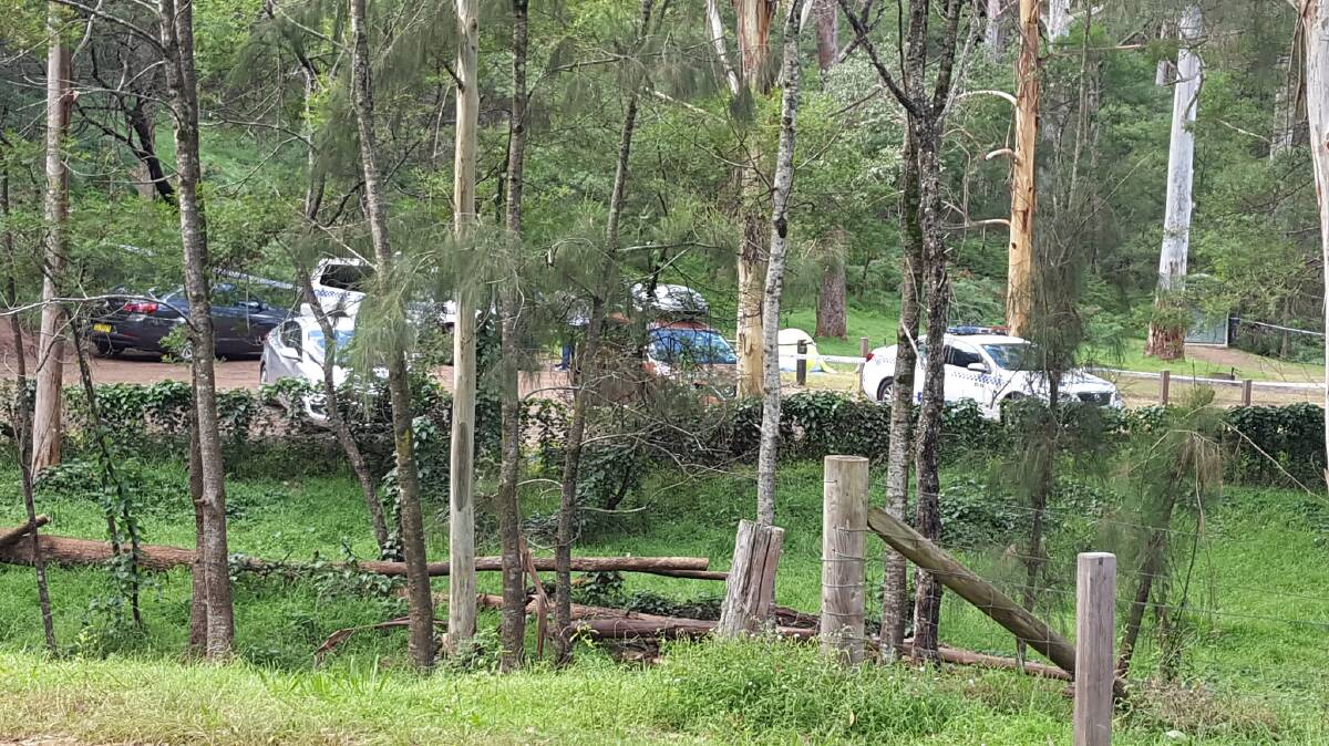 Police at the campsite at Glenbrook where a woman's body was found in a tent.