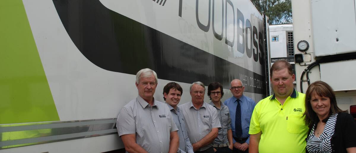 Family affair: Jeremy Bray (in fluoro top) with FoodBoss's Robyn Gibson and Graham, Matthew and Robert Gibson and David Robert. Rear, Peter Welling from Nova. 