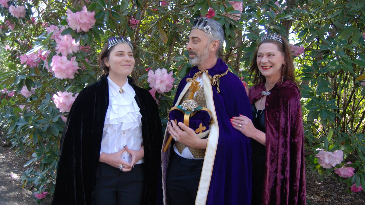 Rhodo Festival royalty: Tibby McKenzie with parents Bruce and Michelle. Crowns by Demonkitty, a Hazelbrook-based local artist. Photo in the Campbell Rhododendron Gardens, Blackheath.