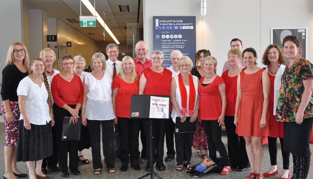 Time to shine: Members of the Shine Community Choir, who have been invited to sing in the Lincoln Performing Center next year. Choirmaster Nicole Giezekamp-Bakija is on the left and Blue Mountains MP, Trish Doyle, at right.