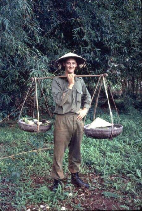 Ken Houston trying out the local life in Vietnam, 1968.