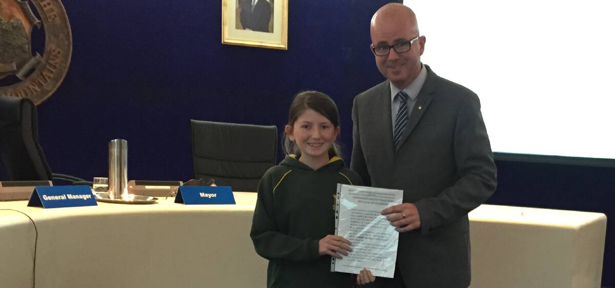 Crossing needed: Lavinia Loscialpo presented her petition to Blue Mountains mayor, Mark Greenhill, at last week's council meeting.