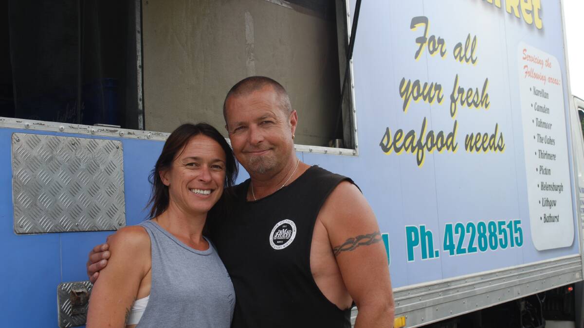 Fresh is best: Marc Robinson and his partner in life and business, Danielle, with their fresh fish van near the New Ivanhoe Hotel in Blackheath.