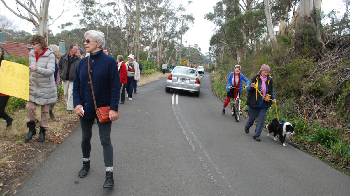 Railway Parade: Residents walked the road in June, protesting against the lack of footpaths on the narrow stretch west of Leura Mall.