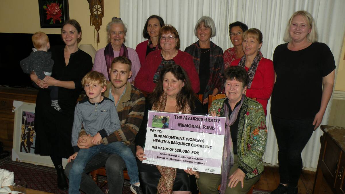 Great legacy: Suzie Van Opdorp, seated centre, with family members as well as members of the BMWHRC Management Committee.