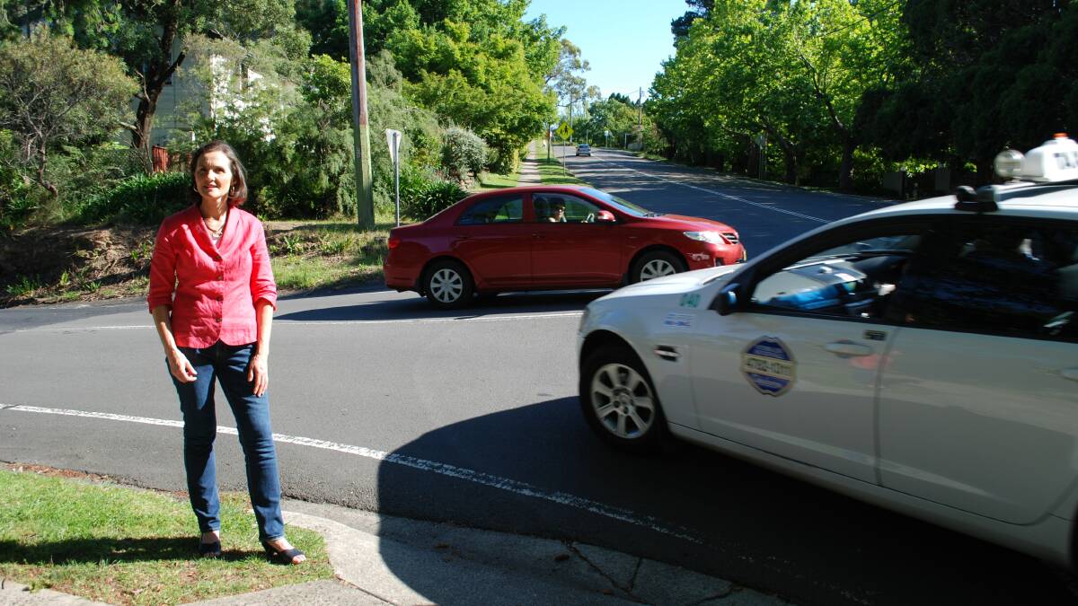 Cr Romola Hollywood on the corner of Sinclair Crescent and Blaxland Road, Wentworth Falls, which many find dangerous.