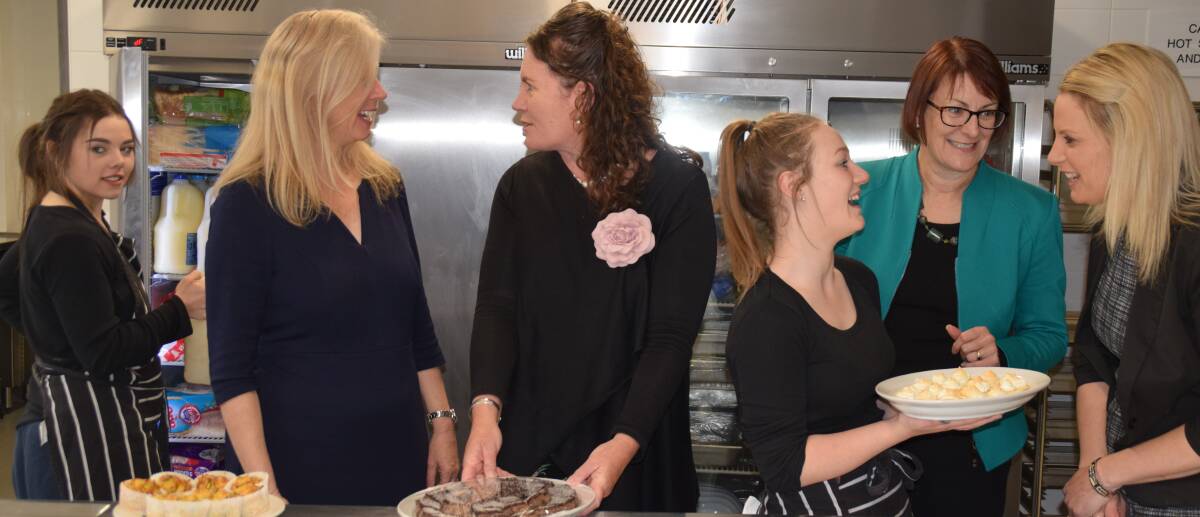 What's cooking: Kaylee Honey, Jennie Boyall, Trish Doyle, Tahlia Harries, Susan Templeman and Louise Hanrahan in the new facilities at Katoomba High School.