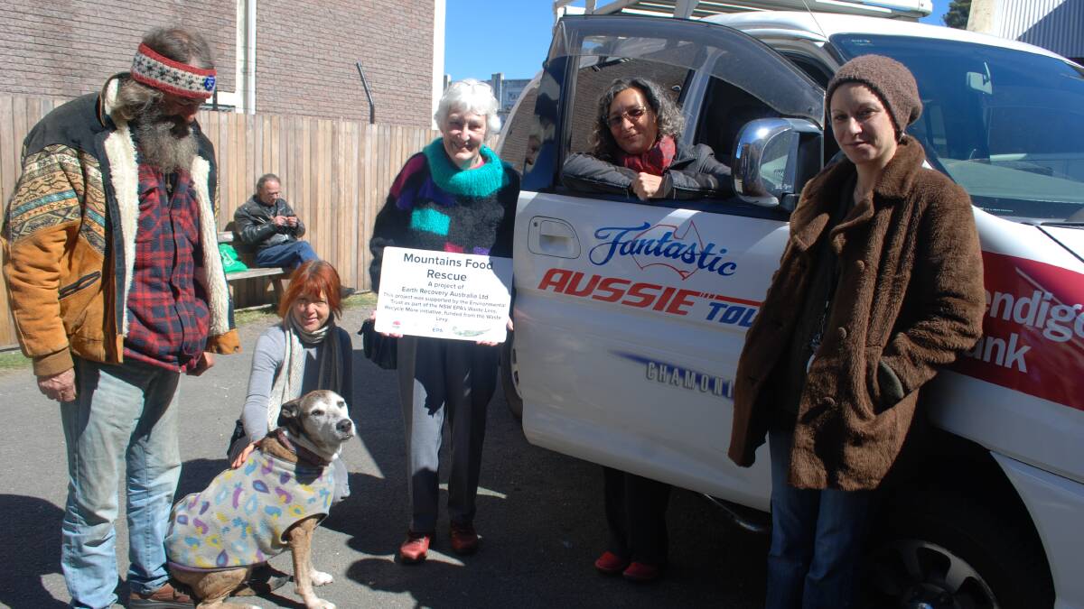 Call for sponsors: Malcolm and Bella (the dog) with Maddy Yates, Jean Ingle, Rosa Del Ponte and Ahlei Bliss with one of the food rescue trucks.