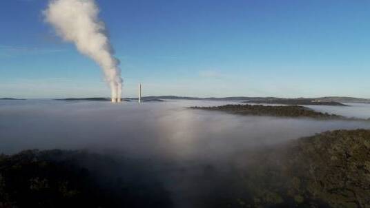 Steam rises from EnergyAustralia's Mount Piper power station, near Lithgow. Photo: Nick Moir