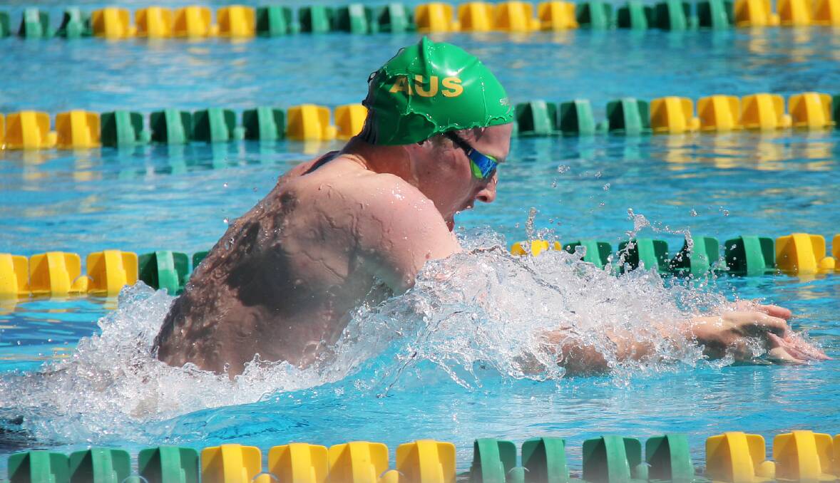 In action: Matt Wilson in the pool at the Junior Pan Pacific Championships in Hawaii where he won two individual silver medals and two relay medals.