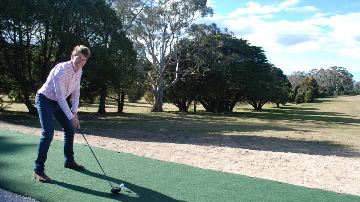 Edward Fernon tees up at the new driving range at Katoomba Golf Course. It is open daily from 2-5pm.
