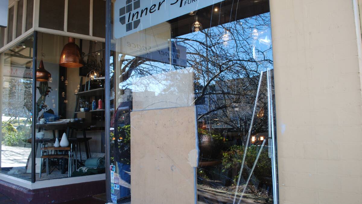 The boarded-up window of Inner Space in Leura.