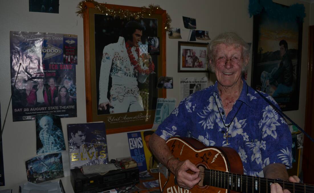 THE KING: Elvis Presley fan Gerard Barnes with his memorabilia. Picture: Bradley Jurd