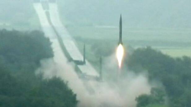 A missile is launched during a drill at an undisclosed location in North Korea.  Photo: AP 