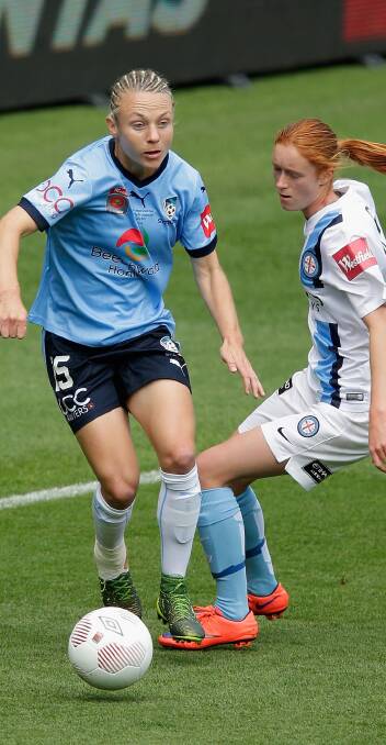 Grand final action: Teigen Allen chases down the ball from Melbourne City's Beatrice Goad.