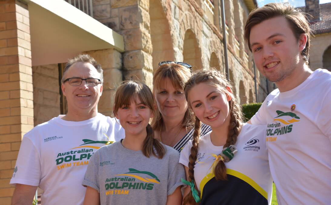 Supportive family: Jenna Jones with her dad Bradley, mum Therese and two of her five siblings, Katelyn (13) and Luke (18). Jenna will compete in five swimming events at the Paralympics.