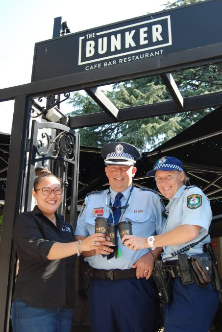Coffee and a chat: The Bunker manager Liz Griffiths with Inspector Ian Colless and Senior Constable Melissa Rosevear, who will be at the event.