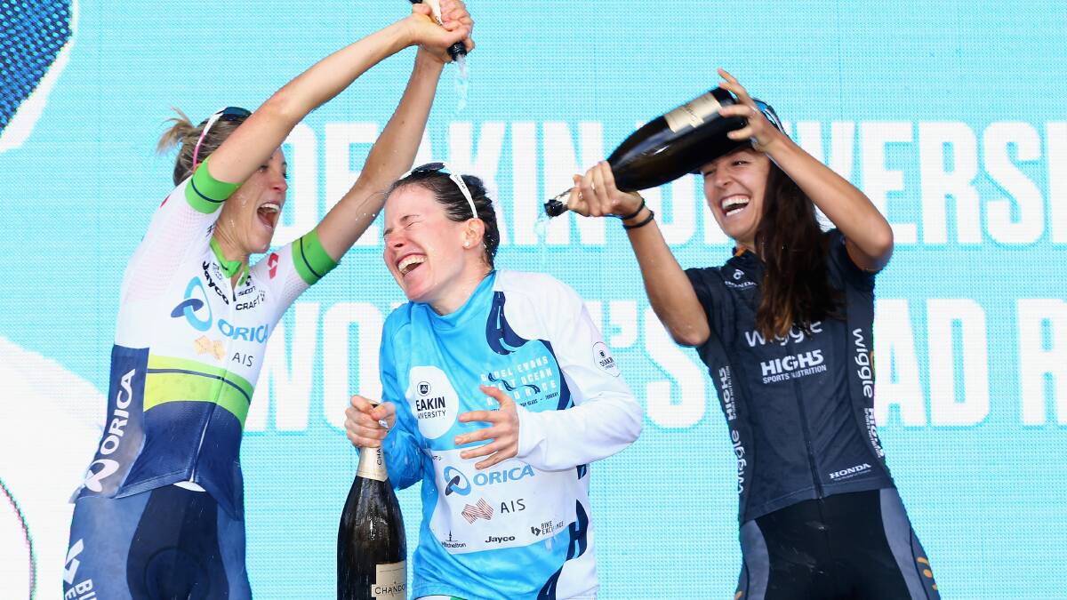 Victorious: Amanda Spratt of Orica-AIS (centre) with team-mate Rachel Neylan and Danielle King of Wiggle High5 after winning the elite women's road race at the Cadel Evans Great Ocean Road Race on January 30 in Geelong. Photo: Robert Cianflone/Getty Images