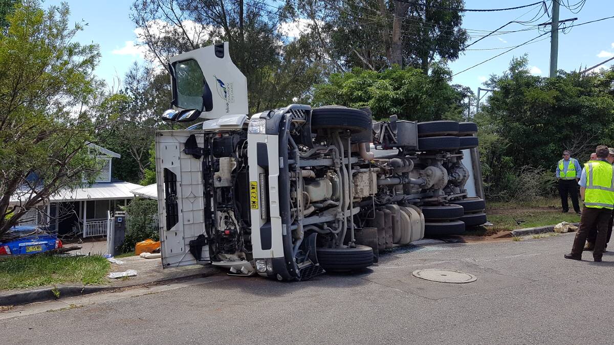 The waste services truck overturned in Faulconbridge on Friday morning. Photo: Top Notch Video