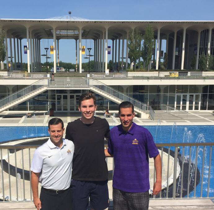 Getting to know the staff: Adam Lulka with Great Danes assistant coaches Jon Iati and Jared Knotts at the University at Albany.
