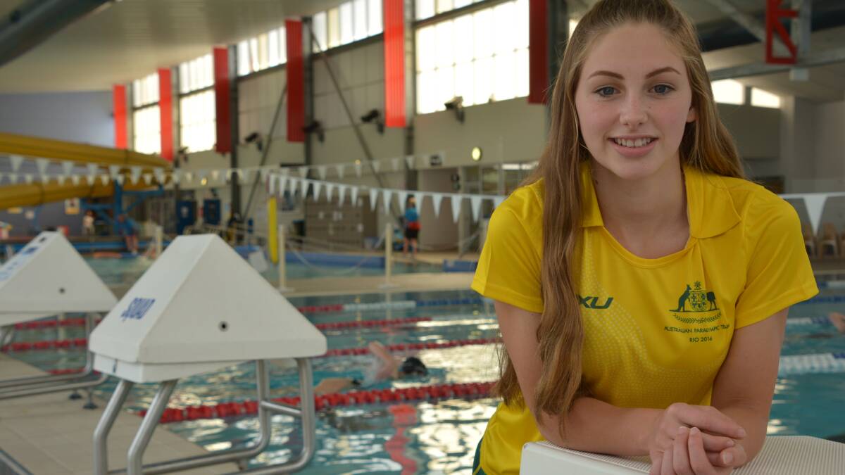Still buzzing: Jenna Jones, home from the Rio Paralympics and keen to get back in the water again at Springwood Aquatic and Fitness Centre.