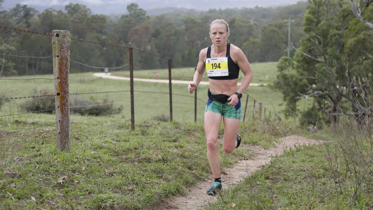 Winner: Glenbrook runner Marnie Ponton was the first woman to cross the finish line in Saturday's Six Foot Track Marathon. Photo: Supersport Images 