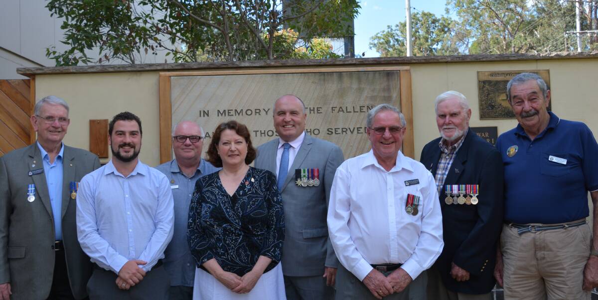 Marches meeting: Veterans affairs minister David Elliott (centre) with some of the people at the meeting. From left: John Wakefield, Jim McKinnon, Paul Macklin, Peter Jones, (front) Brendan Christie, Rosa Sage and Ralph Forsythe.