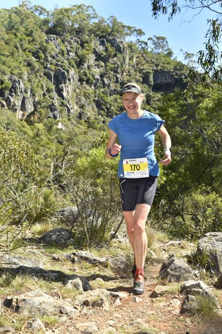 Light on her feet: Lou Clifton competing in the Six Foot Track Marathon in March. The Mt Victoria runner makes her UTA100 debut on May 20. Photo: Supersport Images