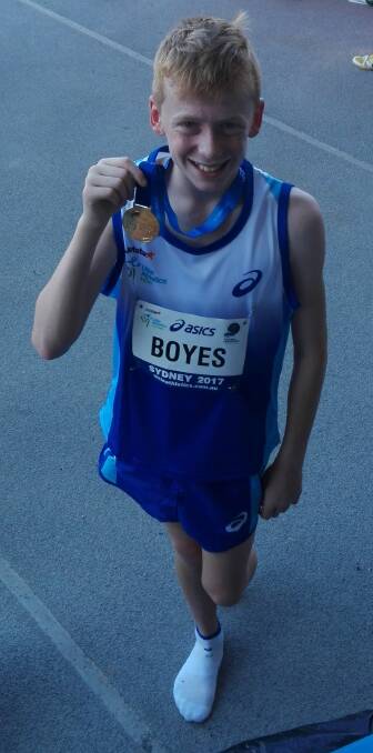 National champion: Luke Boyes with his gold medal from the 1500m.