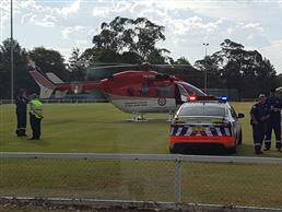 Rushed to Westmead: Emergency services near the scene where a Springwood boy fell from his mountain bike on Monday afternoon. Photo: Top Notch Video 