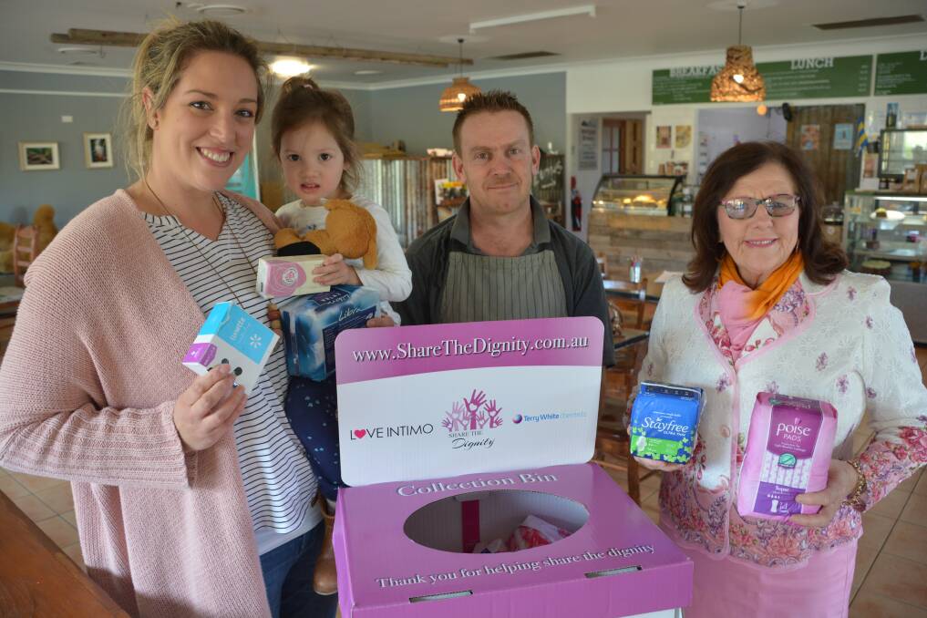 Woodford collection point: Share the Dignity's Kate Paul, her daughter Evie, with 20 Mile Hollow cafe co-owner Chris Soucek and volunteer Brenda Fowler.