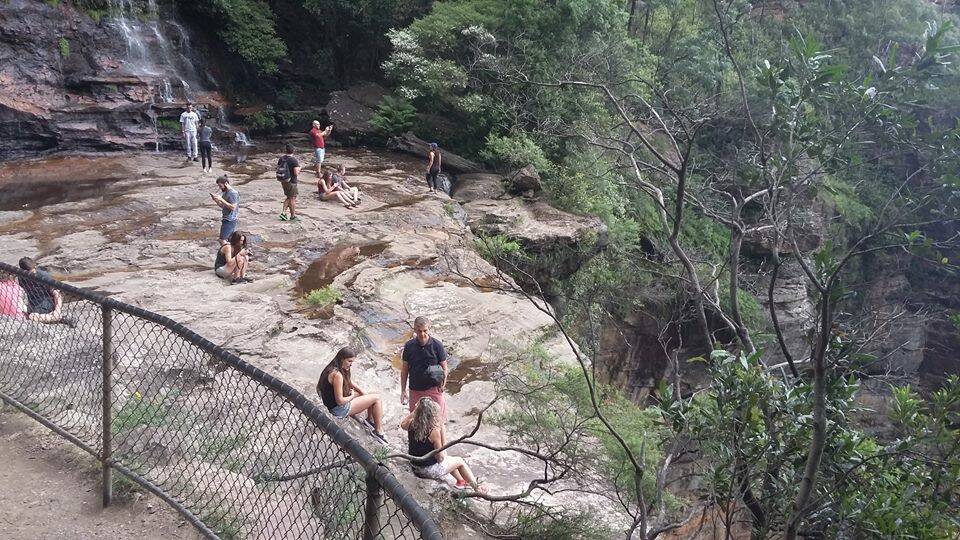 Dangerous: At Katoomba Falls on December 29, just metres from a 100m drop. Photo: Blue Mountains LAC Facebook