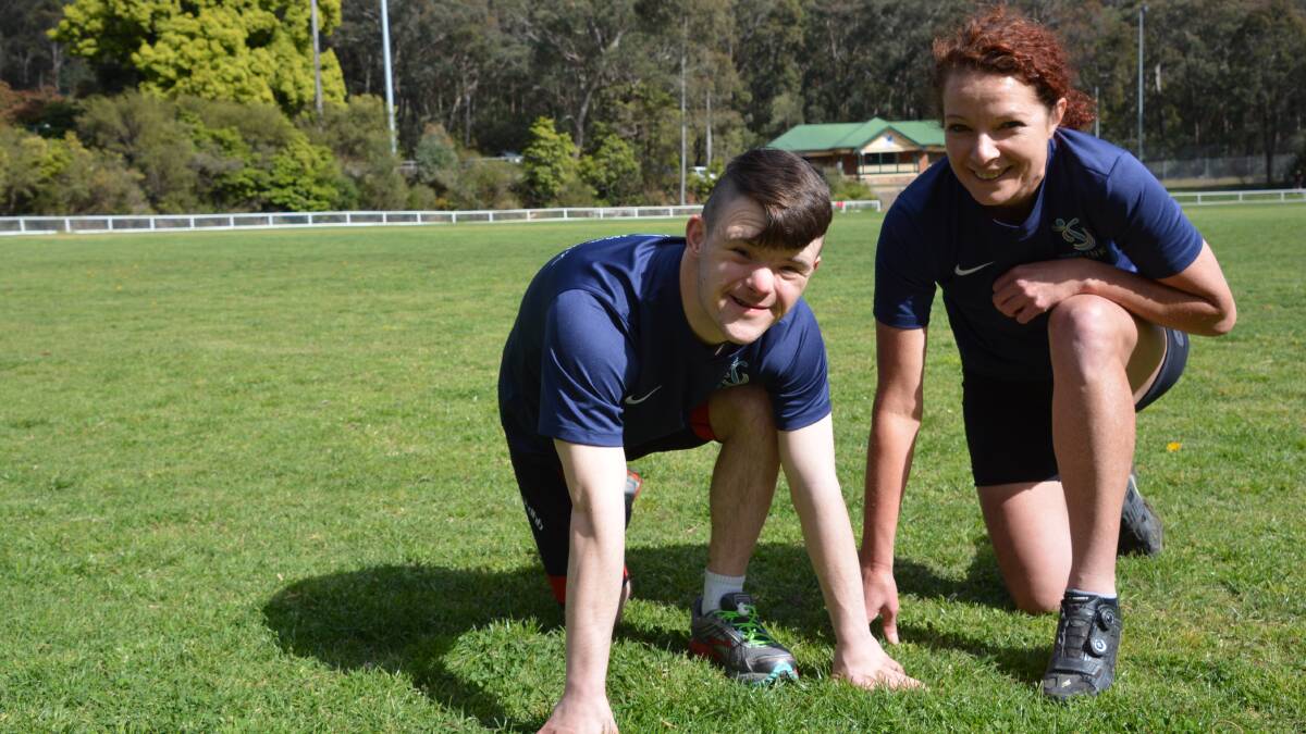 Ready, set, go: Josiah Bamber from Hazelbrook, with personal trainer Libbi Clarke. Josiah will take part in his first half marathon on October 1.