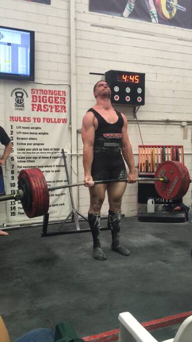 Gavin Brown deadlifts 300kg.