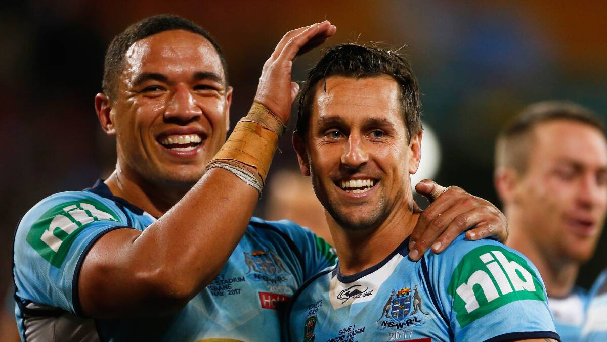 Tyson Frizell and Mitchell Pearce celebrate winning game one of State of Origin. Picture: Getty Images
