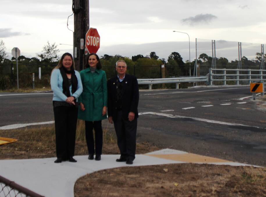 Safer for pedestrians: Councillors Annette Bennett, Romola Hollywood and Chris Van der Kley test the new footpath along Railway Parade and Park Road in Woodford.