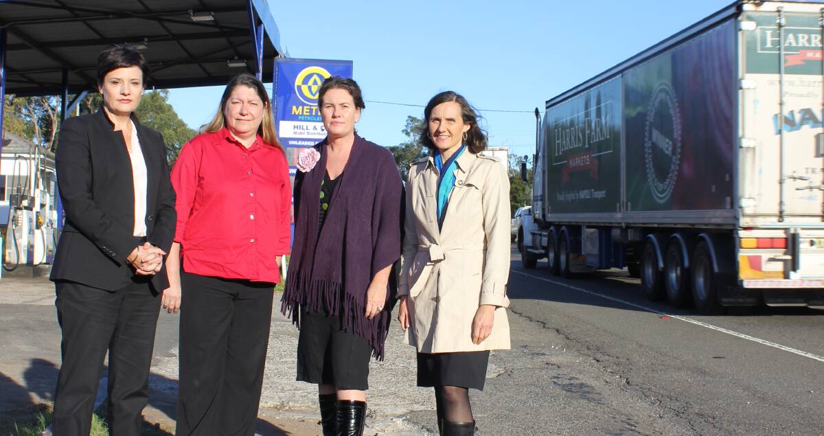 Labor’s roads spokeswoman Jodi McKay, Cr Annette Bennett, Blue Mountains MP Trish Doyle and Cr Romola Hollywood beside the highway at Faulconbridge.