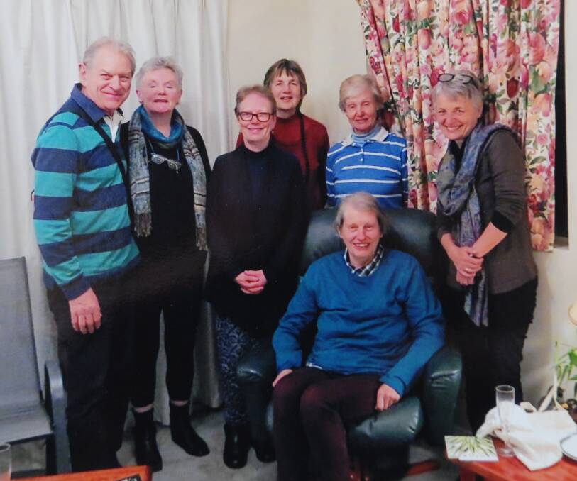 Marie McInnes (seated) with fellow Amnesty International supporters. The Springwood resident has retired after 38 years as the convenor of the Blue Mountains branch of Amnesty International.