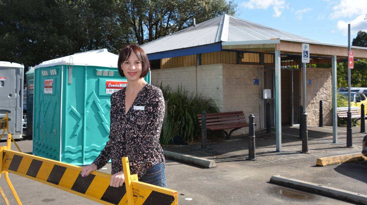 Upgrade underway: Cr Shae Foenander at the public toilets in Springwood town centre.